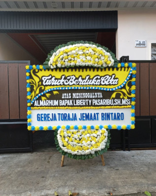 Papan Bunga Duka di Ampari Bura